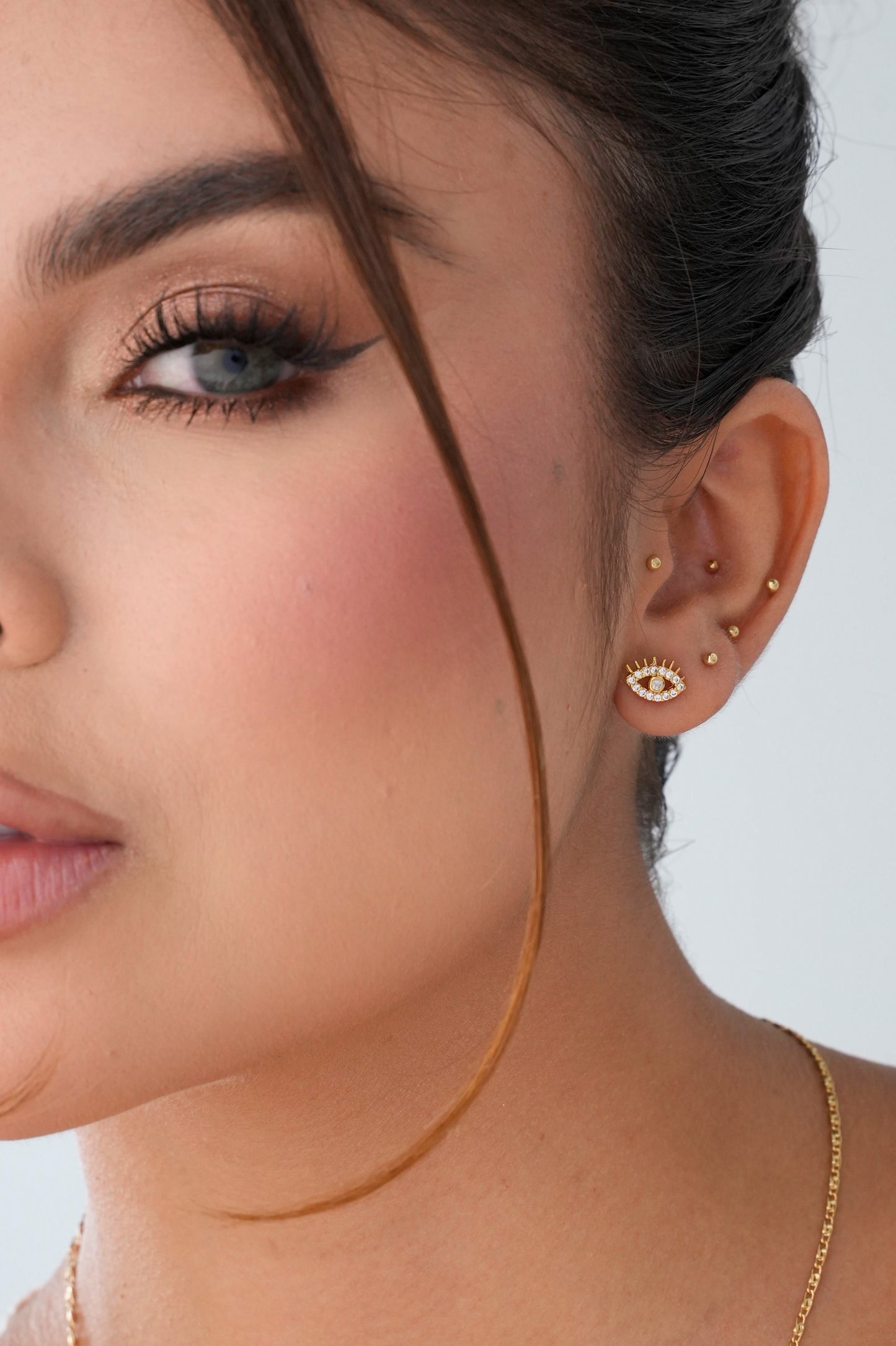 Arete Topo Ojo Turco Cristal