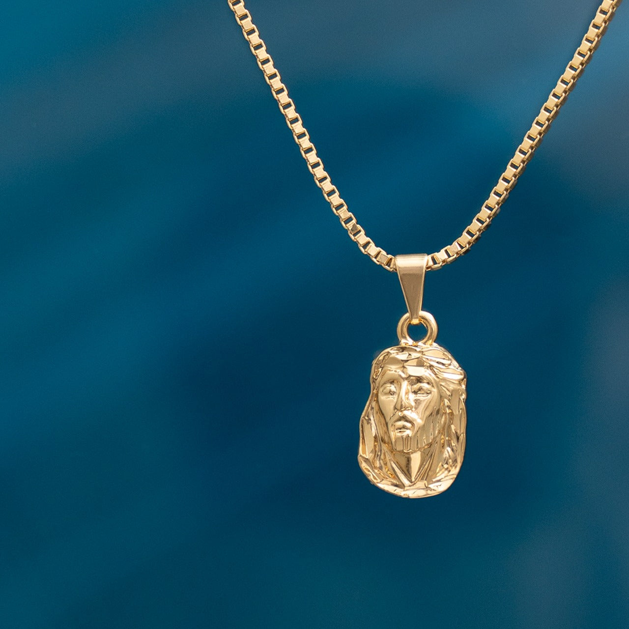 Dije Rostro Mediano Tallado