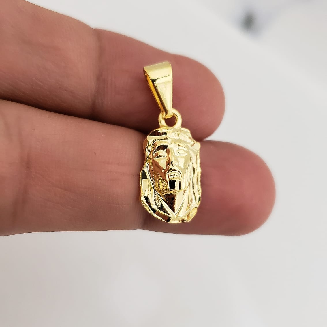 Dije Rostro Mediano Tallado